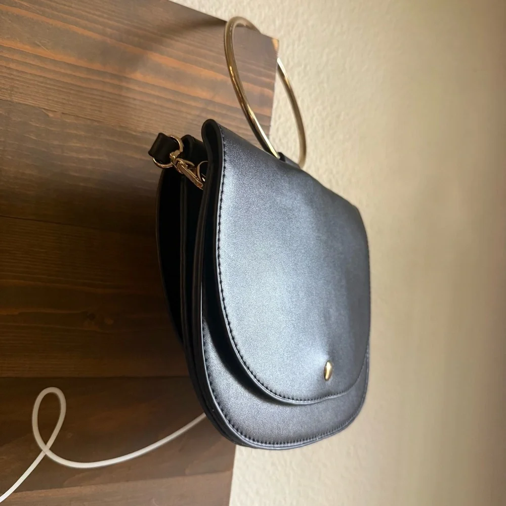 MADISON WEST Elegant Black Leather Handbag with Gold Hoop Handle - Picture 2 of 7